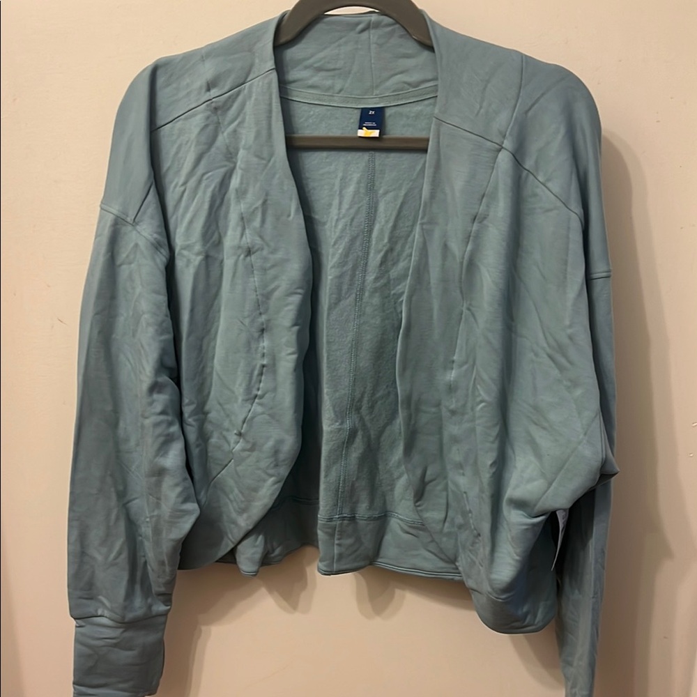 Old Navy blue shrug with thumb holes.